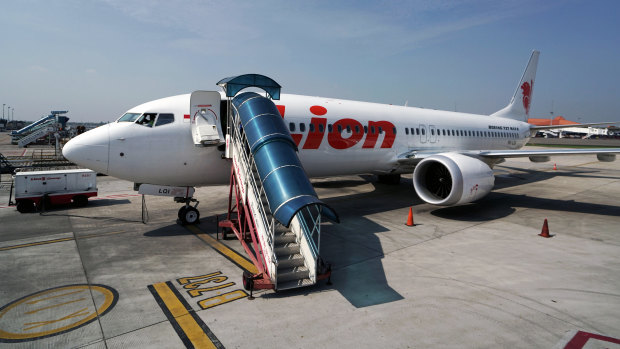 A grounded Lion Air Boeing 737 Max 8 aircraft sits on the tarmac at terminal 1 of Soekarno-Hatta International Airport in Cenkareng, Indonesia.