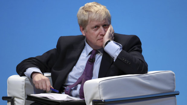 Boris Johnson addresses Conservative Party members during the Conservative Party leadership contest in Birmingham.