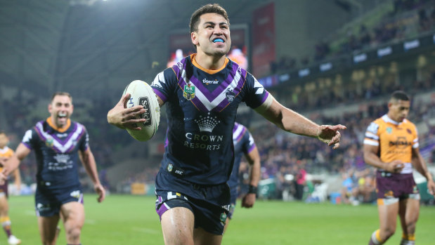 Jahrome you go: Melbourne fullback goes over the line at AAMI Park as Storm sink the Broncos in round 14.