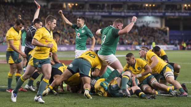 Luck of the Irish: The visitors celebrate their only try of the match in a tight Test.