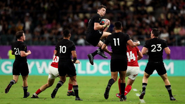 New Zealand's Beauden Barrett goes up high.