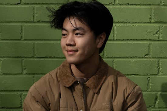 Norman Huang, a final-year student in commerce and computer science, welcomed the 20 per cent cut to student loans that passed parliament.
