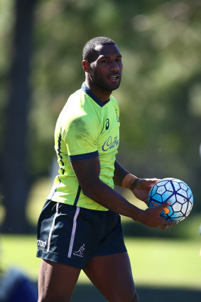 Suli Vunivalu showing his skills in a third football code at Wallabies training.