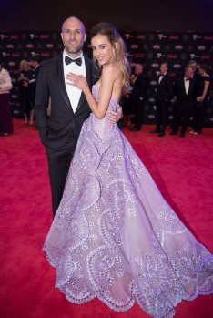 The one-time queen of the Brownlow red carpet, Bec Judd, with husband Chris, in 2018.