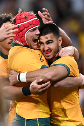 Harry Wilson and Tom Wright celebrate a stunning victory over the All Blacks in Brisbane in 2020.