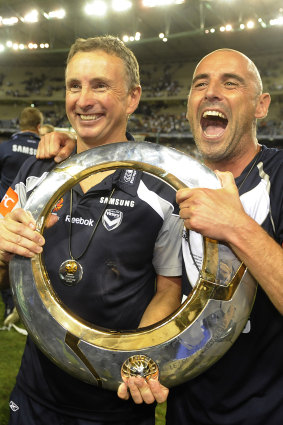 Merrick and Muscat celebrate the 2009 A-League grand final win.  