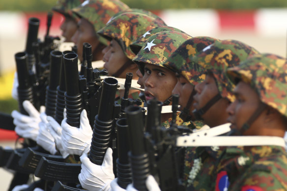 Military officers march during a parade to commemorate Myanmar’s 78th Armed Forces Day in Naypyitaw last month.