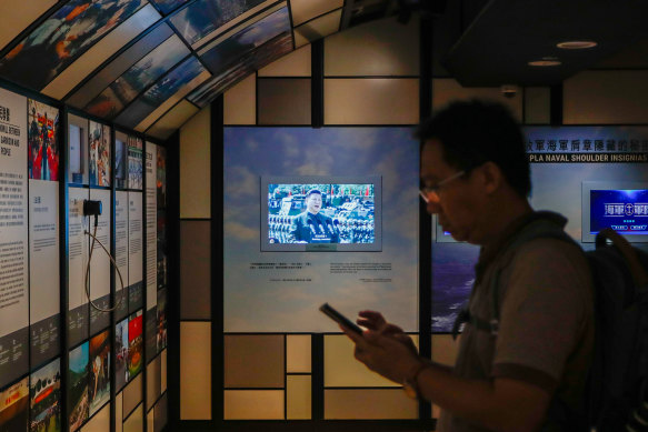 On a loop: Xi Jinping rallies the troops at Hong Kong’s Museum of Coastal Defence. 