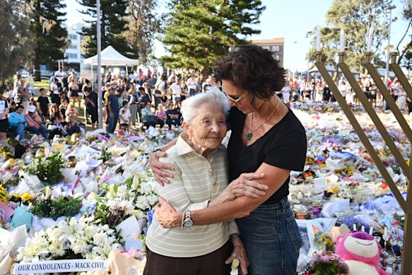 Mourners continue to gather at the Bondi Pavilion memorial following Sunday’s attack.