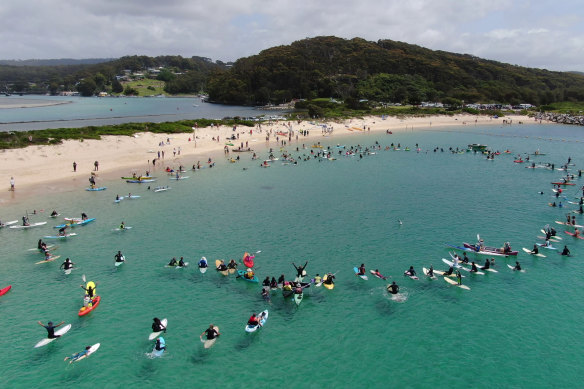 As many as 400 people joined a paddle to support the reinstatement of marine sanctuaries in the Batemans Bay area.