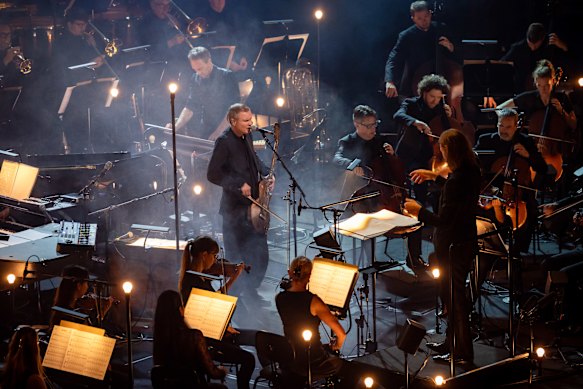 In this tour’s orchestral mode, Sigur Ros position themselves with the Sydney Symphony Orchestra as part of the ensemble.