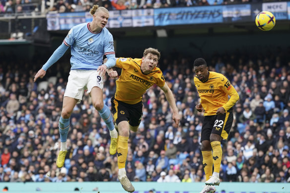 Manchester City’s Erling Haaland heads home – again.
