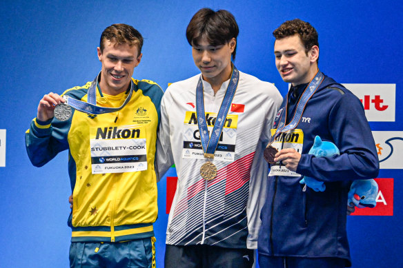 Zac Stubblety-Cook, Qin Haiyang and Matt Fallon at the World Championships in 2023.