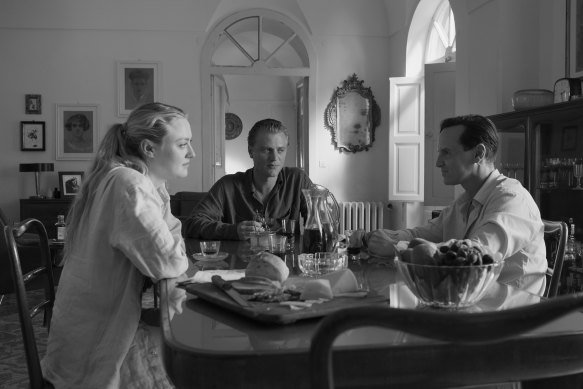 Dakota Fanning as Marge, Johnny Flynn as Dickie and Andrew Scott as Tom in <i>Ripley</i>.