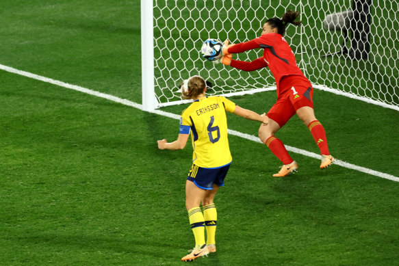 Sweden’s Zecira Musovic makes a save from Alex Morgan.