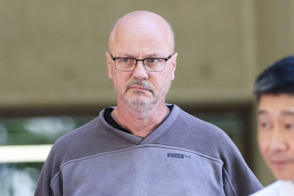 Prominent Sydney barrister, Mark Dennis SC, is released on bail from Surry Hills Police Station.