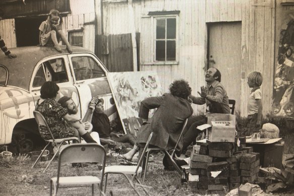 Outside painter John Bell’s studio at Dunmoochin, Victoria, 1969. Louise is on the car; Tim, at far right, stands behind John Olsen.