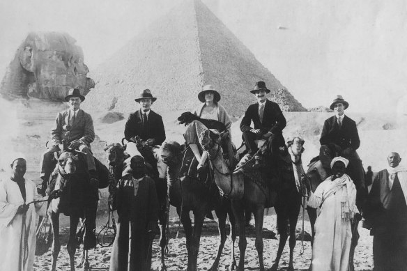 Enid Lindeman and some male friends take to the saddle for a viewing of the pyramids and sphinx at Giza.