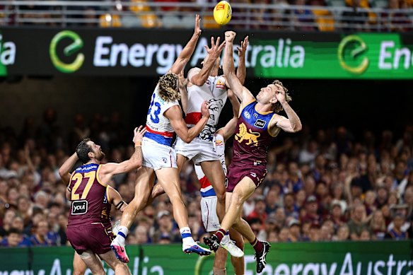 Eyes on the prize: The Bulldogs and Lions played out an epic.