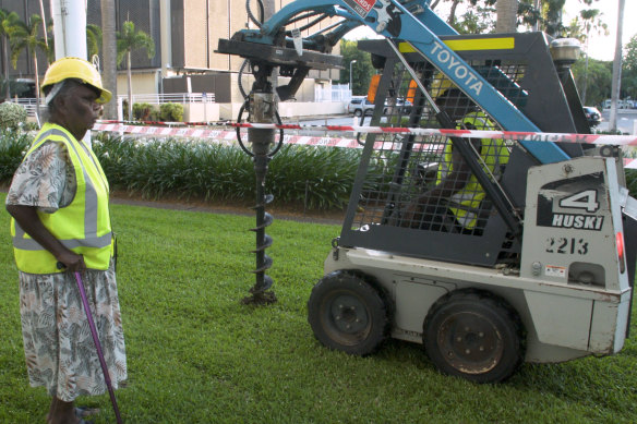 Nancy McDinny supervises a mini-bulldozer drilling on the Northern Territory Parliament's lawn in Darwin in April as part of a group of traditional owners protesting against fracking proposals for their land.