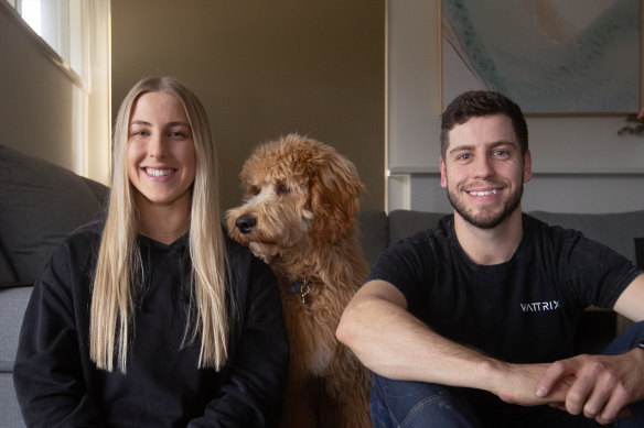 First home buyers Chloe Tan Sing and her partner Kieran Perkins and dog Beebs.