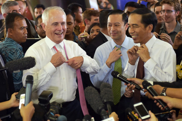 Comfort zones: Malcolm Turnbull and Joko Widodo take off their ties during a visit to Jakarta's Tanah Abang market in November 2015.