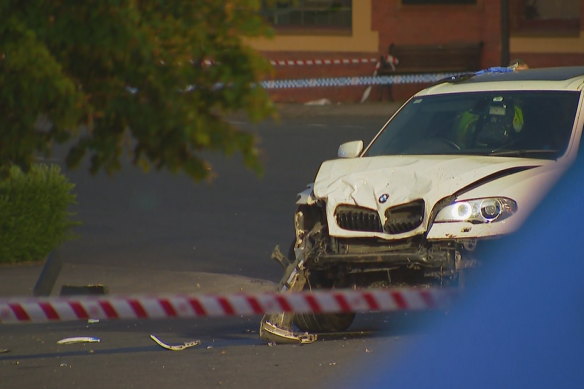 The damaged white BMW SUV remained outside the pub on Sunday night as investigations continued. 