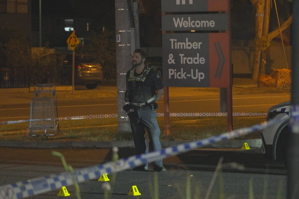 Police at the Bunnings car park following the incident.