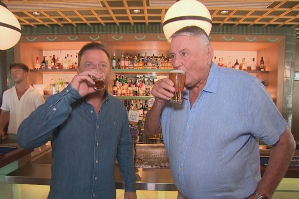 Arthur Laundy shares a beer with Ben Fordham after it was announced that Nine Entertainment sold its radio networks including 2GB and 3AW.
