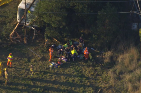 Thirty students were pulled from an overturned school bus. The driver died at the scene