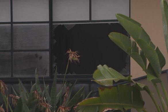 Teenagers smashed through a window to escape a burning home.