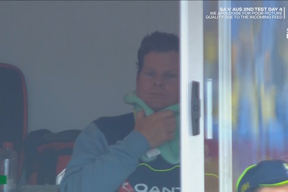 Steve Smith seen nursing his injured neck during the second Test of the series.