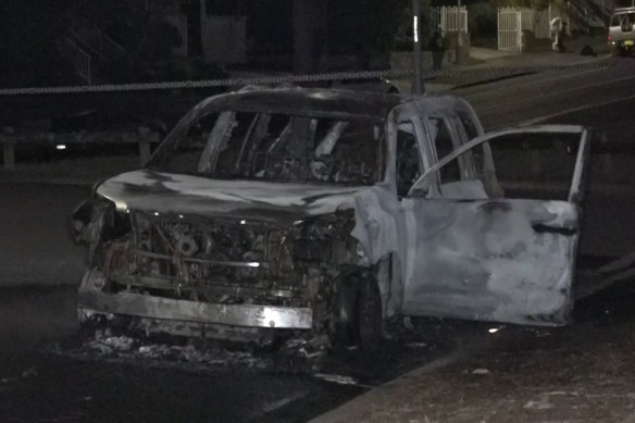 A burned out car in Bonnyrigg Heights on Monday. Photo TNV
