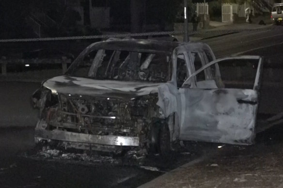 A burnt-out car in Bonnyrigg Heights on Monday.