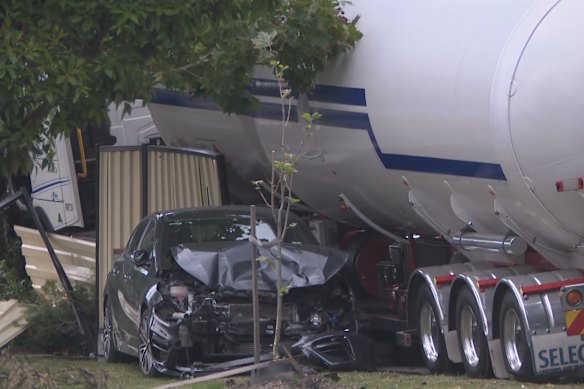 Three people were taken to hospital after the collision in Carnegie on Tuesday. The circumstances of the incident remain unclear.