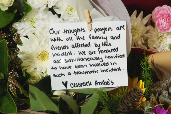 The tribute left by Cessnock ambulance workers at the site of the Hunter Valley crash.