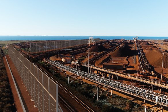 An artist’s impression of the 30-metre wind fences BHP plans to install at its two iron ore offloading facilities.