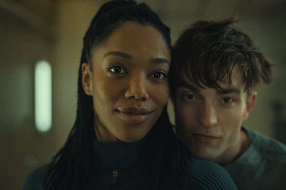 Naomi Ackie and Robert Pattinson in a scene from Mickey 17.