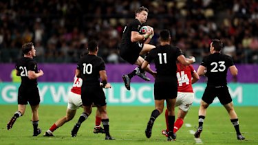 New Zealand's Beauden Barrett goes up high.