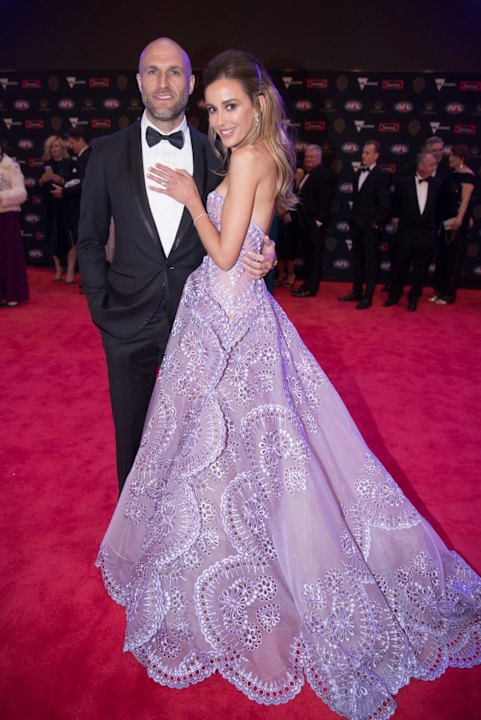The one-time queen of the Brownlow red carpet, Bec Judd, with husband Chris, in 2018.
