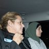 Janai Safar is taken to Mascot police station after arriving at Sydney airport from Doha. 