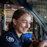 Firefighter Amber Murphy behind the wheel of one of the new state-of-the-art trucks at Western Sydney Airport.