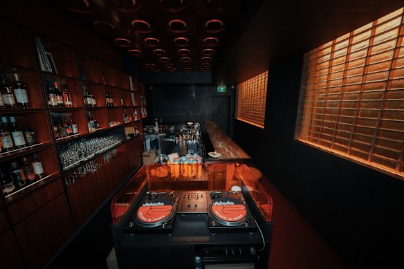 The bar features top-quality audio equipment, from decks to speakers.