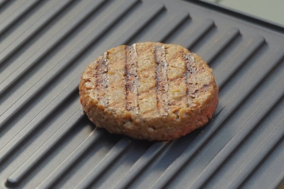 A browned plant-based “beef” patty using ReplihueTM