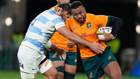 Australia’s Samu Kerevi, right, runs at Argentina’s Pablo Matera during the Rugby Championship test match between Australia and Argentina in Sydney, Australia, Saturday, July 15, 2023. (AP Photo/Rick Rycroft)