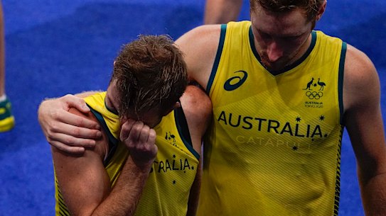 Jacob Whetton is comforted by a teammate after missing the last shot of the penalty shootout.
