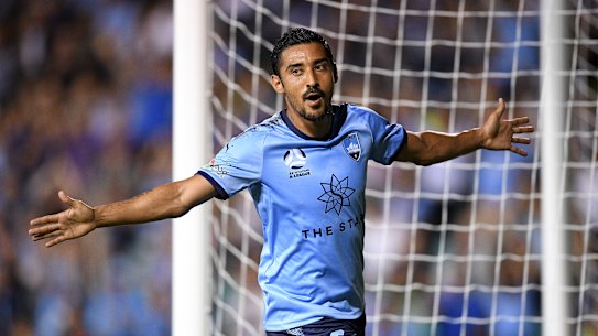 True blue: Reza Ghoochannejhad scores his first goal for Sydney FC.