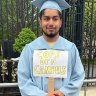Columbia student Suleyman Ahmed in his graduation robe at the university in New York on Thursday.