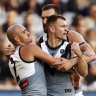 MELBOURNE, AUSTRALIA - MAY 23: Robbie Gray of the Power celebrates a goal with Sam Powell-Pepper and Charlie Dixon of the Power during the 2021 AFL Round 10 match between the Collingwood Magpies and the Port Adelaide Power at the Melbourne Cricket Ground on May 23, 2021 in Melbourne, Australia. (Photo by Dylan Burns/AFL Photos via Getty Images)