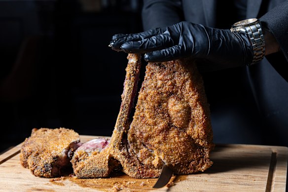 Bistecca fritta, a crumbed T-bone steak pan-fried in clarified butter then finished in the oven, is carved tableside at Made In Casa.